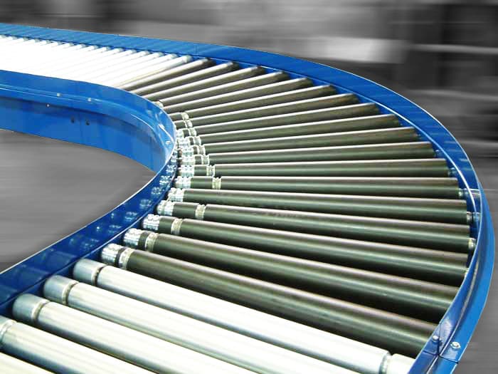 Curved conveyor system for production flow
